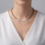 Female model wearing 316L stainless steel DIY beaded necklace to showcase fit for jewelry startups