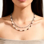 Female model wearing stainless steel DIY beaded chain necklace to showcase fit for distributors