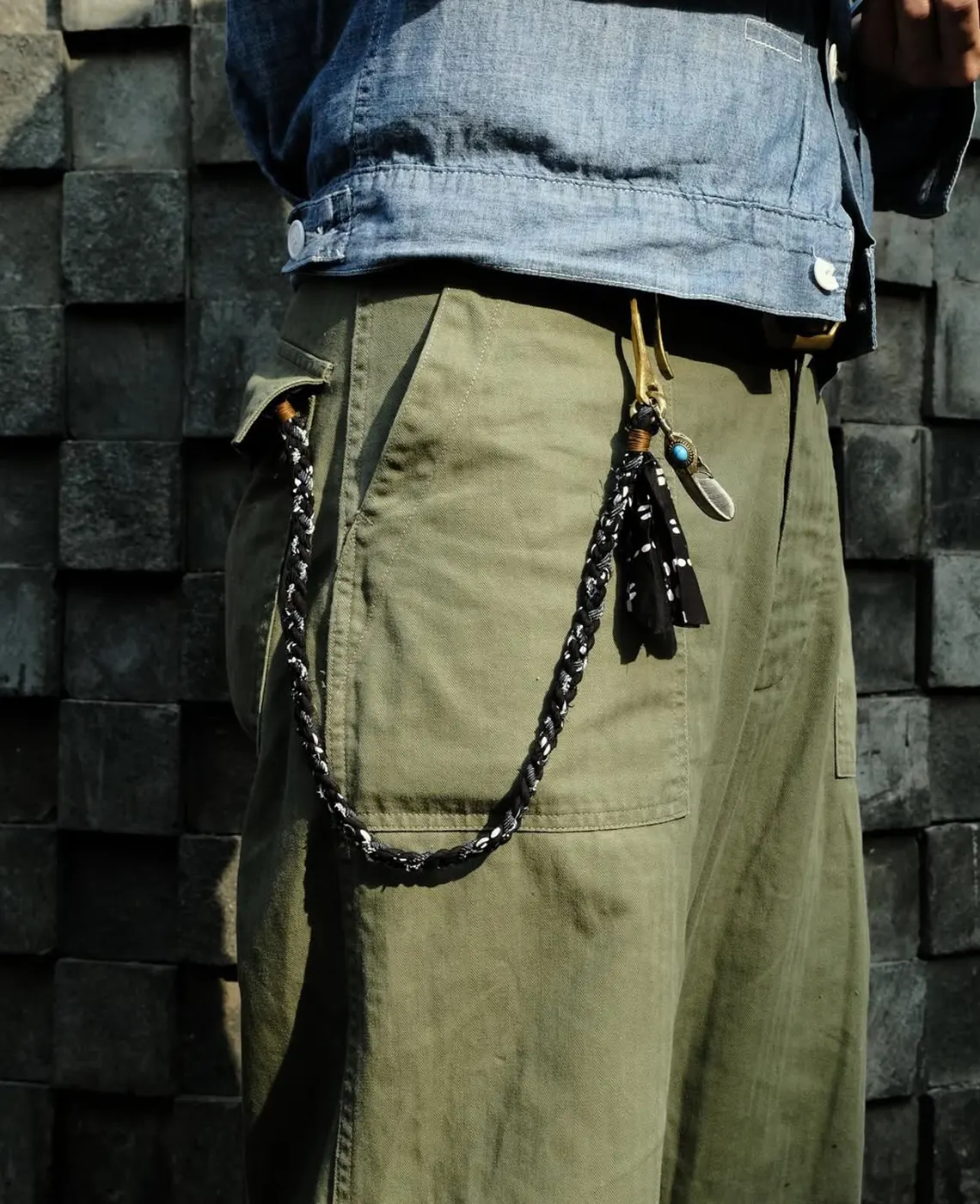 Braided rope and trouser chain with metal and turquoise on olive green cargo pants