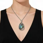 Female Model Wearing Single-Stone Abalone Shell Pendant with White Mother of Pearl for Bulk Jewelry Supply