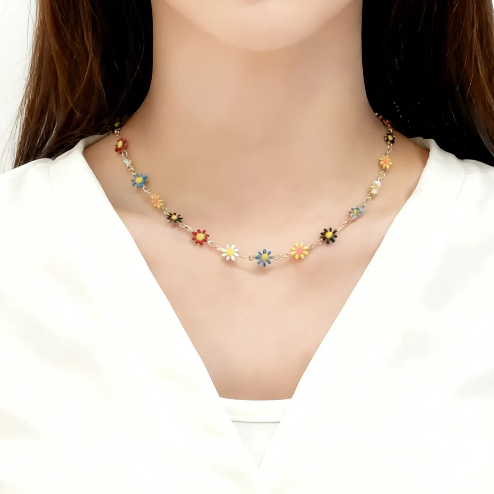 Female model wearing daisy flower necklace stainless steel from direct factory