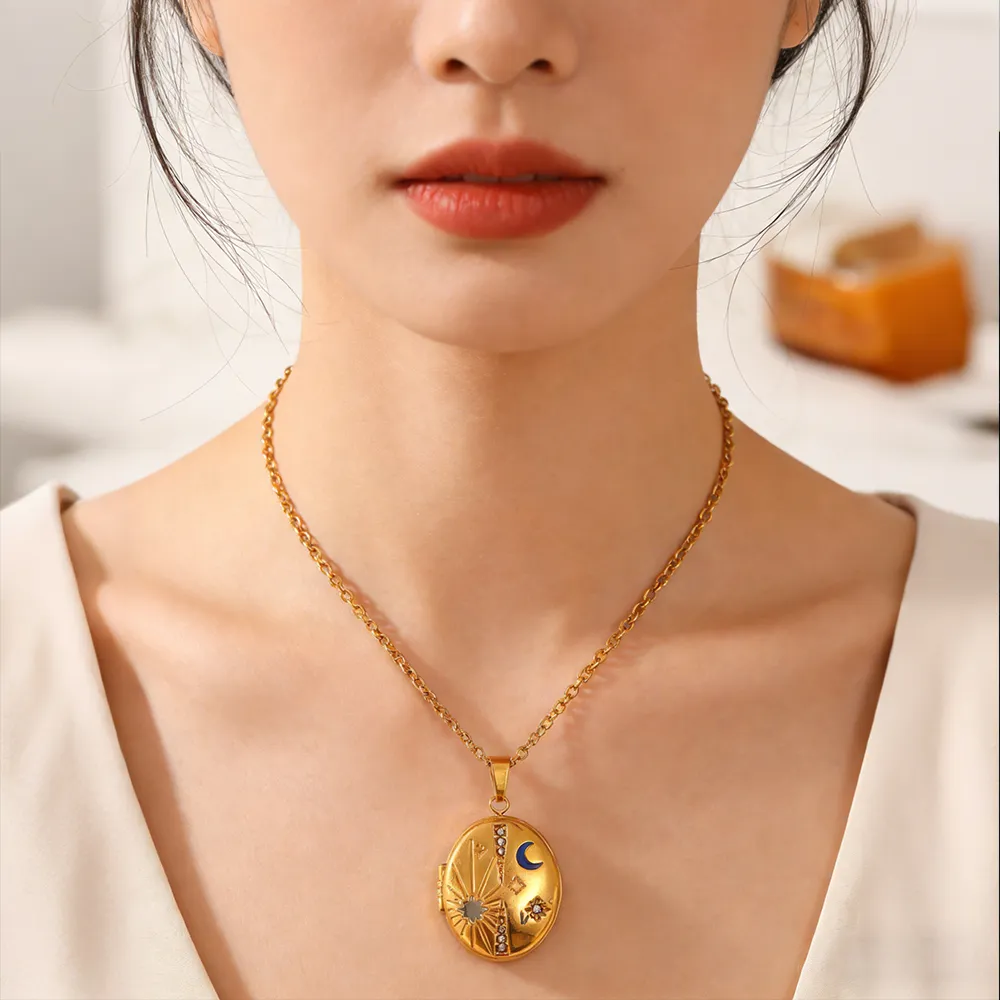 Female stainless steel oval moon & star locket necklace for retailers
