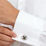 Male Model Wearing Custom Cufflink Featuring Elements of Tribal Badge and Palm Trees for Jewelry Brand