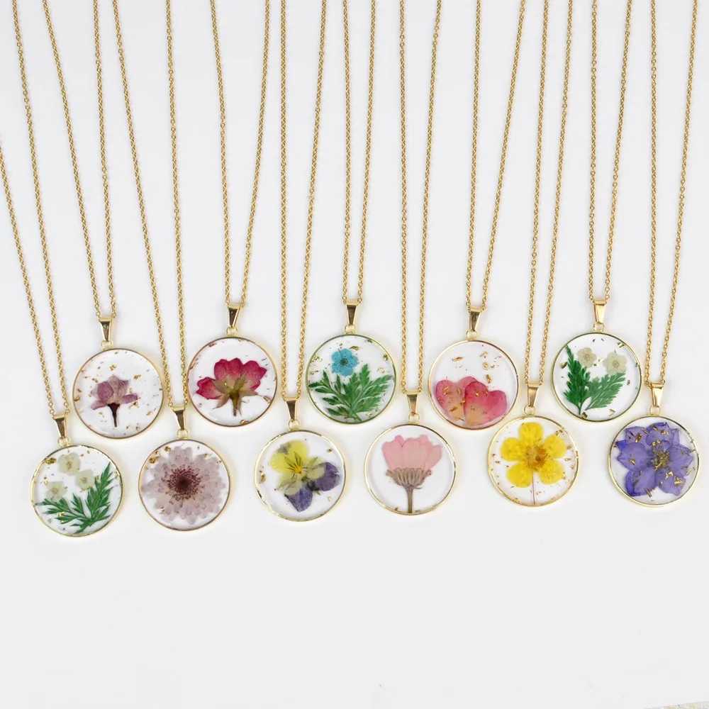 female model wearing stainless steel resin pressed flower necklace from jewelry manufactures