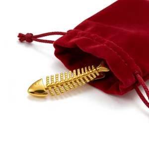 The brass fish tie clip is packaged in a velvet pouch