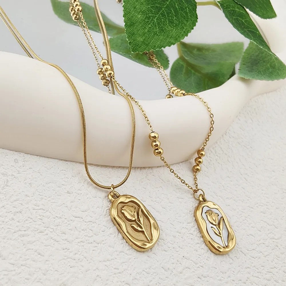 female model wearing stainless steel flower cameo necklace from best suppliers