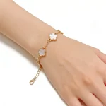 Female model wearing fritillary pearl bracelet to showcase length and fit for brands Extended chain bracelet for different people to wear and fit for brands