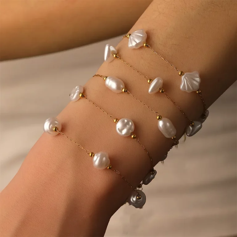 Female model wearing Stainless Steel Baroque Pearl Bracelet to showcase fit for Jewelry Retailers