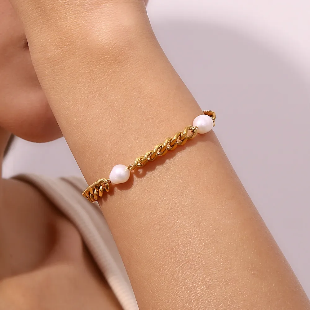 Female model wearing stainless steel imitation pearl bracelet to showcase fit for small brands