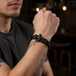 Male Model Wearing Black Arrow Braided Leather Bracelet for Wholesale Buyers