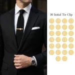 Custom A-Z initial tie bar and male model wearing letter A tie clip to showcase fit for boutique brands