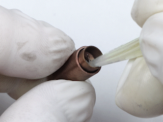 Glue the magnet into the screw lock for a Leather Bracelet