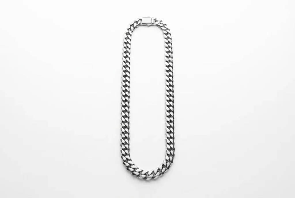 Custom polished stainless steel Miami Cuban link chain in 3:2 product shot – full length laid flat on white matte surface, top-down view with precision fold-over clasp. B2B ready for OEM/ODM orders, ideal for charm bracelet base chains or standalone jewelry.
