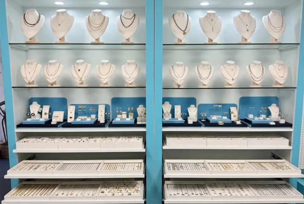 Haosen Jewelry's US-based showroom in San Diego featuring a wide variety of custom necklace, earring, and ring samples for B2B OEM/ODM client reviews.
