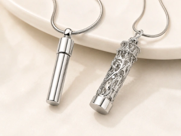 custom-cylinder-stainless-steel-locket-necklace-oem-manufacturer Custom cylinder stainless steel locket necklace in polished and filigree designs for OEM and ODM jewelry manufacturing