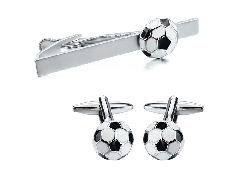 Enamel cufflink and tie clip set with color-filled details and coordinated decorative design