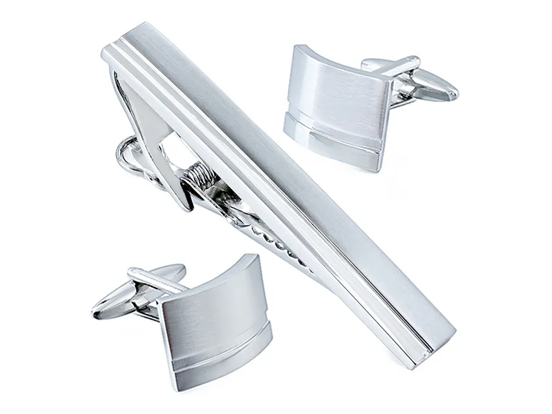 Geometric cufflink and tie clip set with modern angular shapes and matching design