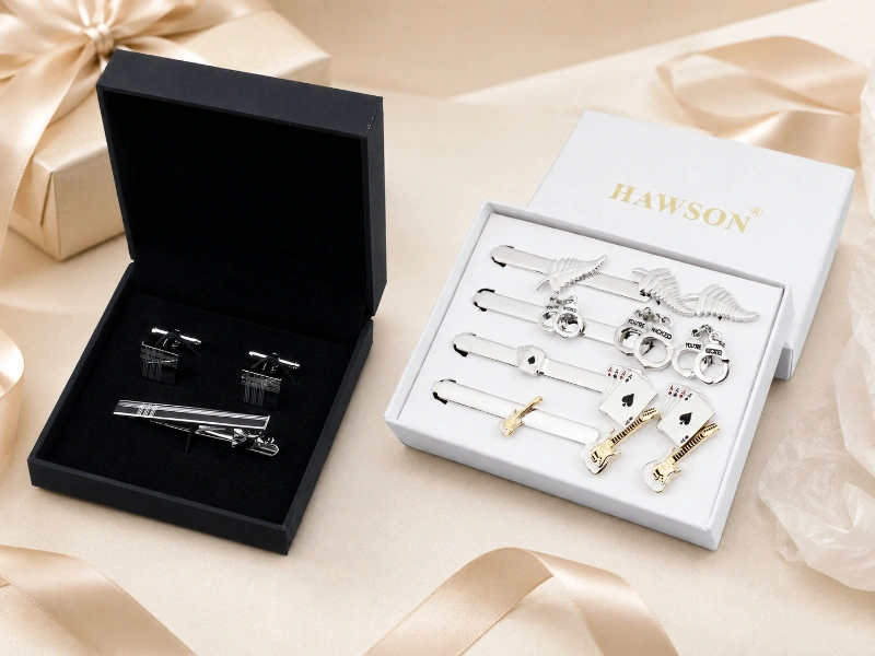 Custom cufflink and tie clip gift sets displayed in branded presentation boxes for private label packaging.