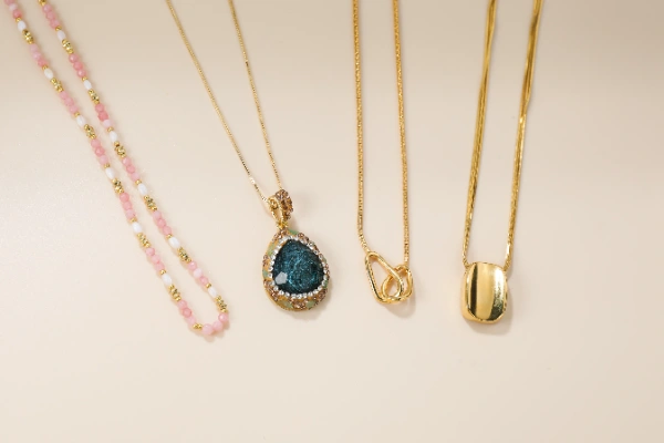 Custom brass necklace length and layering options with adjustable chains, extenders and pendant proportions