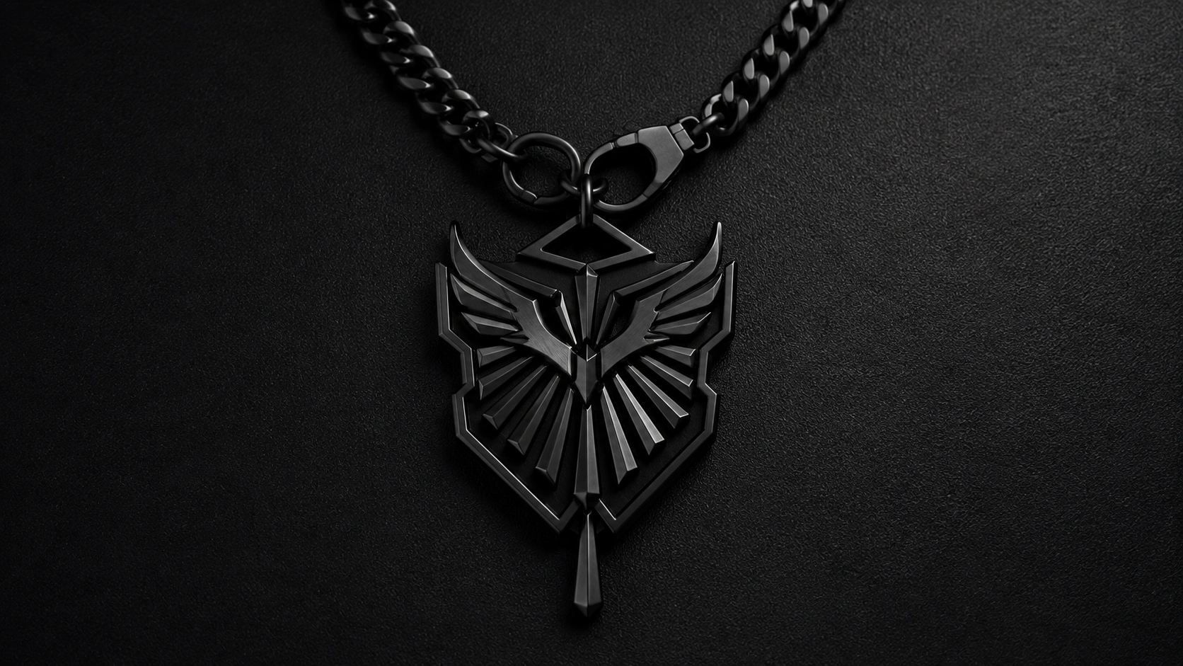 Final black custom stainless steel pendant necklace with geometric wing design and curb chain