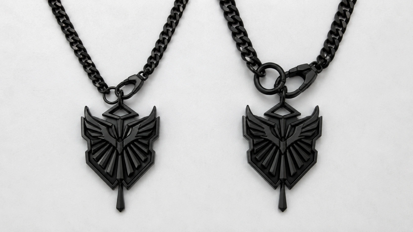 Two black custom stainless steel pendant necklace samples shown for hardware and connector comparison