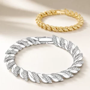 Gold-plated brass bracelet with twisted links and pavé stone details.