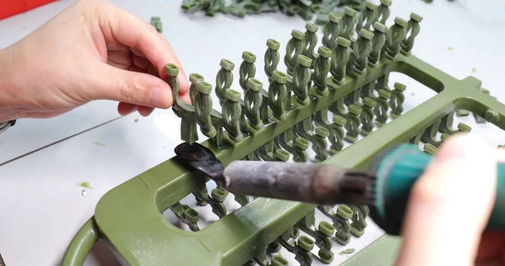 Wax tree assembly for lost wax casting in 316L stainless steel jewelry manufacturing, used to prepare complex jewelry designs before precision casting.