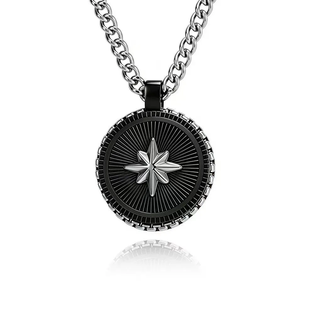 Custom black stainless steel pendant necklace with a silver North Star motif, radial texture and OEM options for chain, plating, logo and finish.