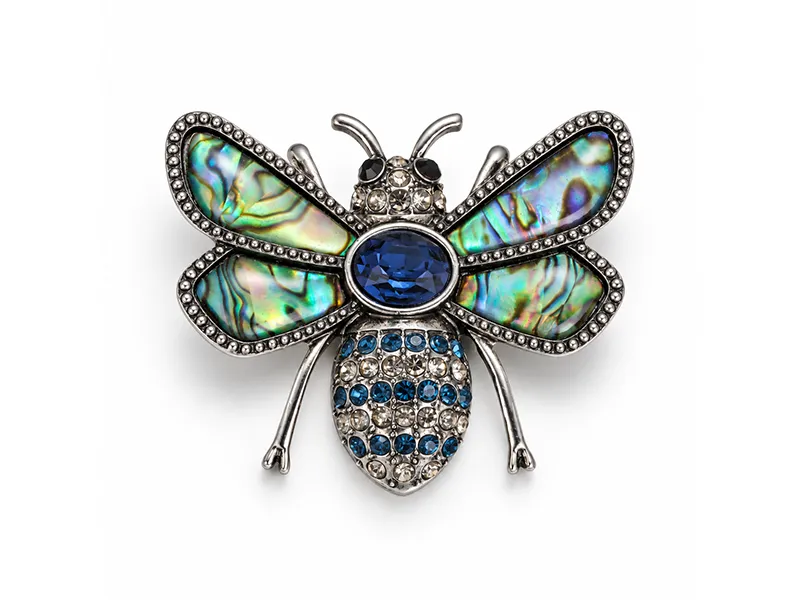 Custom insect brooch with decorative detailing for fashion jewelry and private label collections.