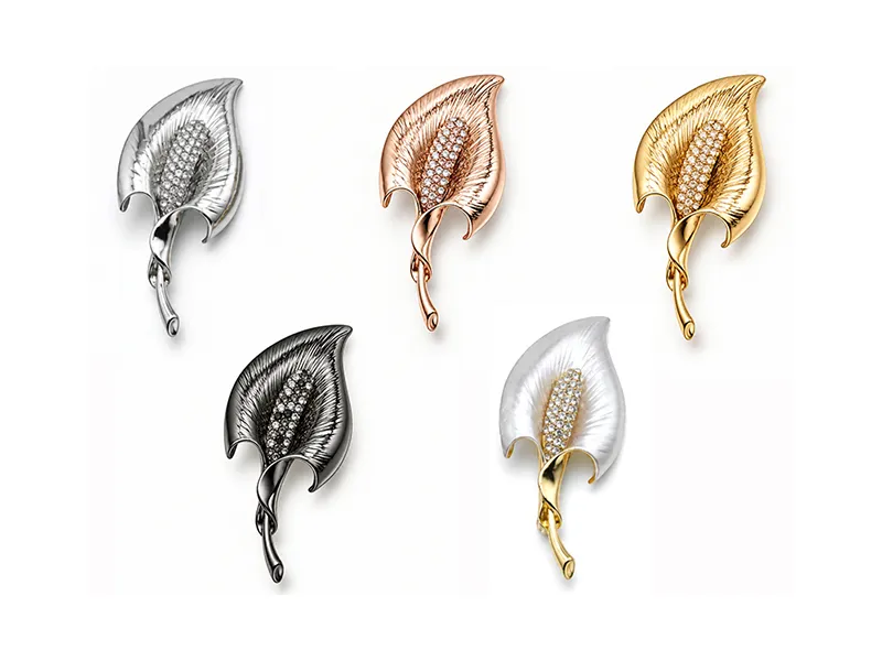 Custom brooch manufacturer showing silver, gold, rose gold, gunmetal and two-tone plating finishes for B2B fashion jewelry collections.
