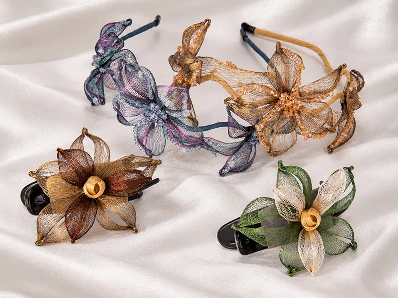 Custom hair accessory collection featuring coordinated floral designs developed from one concept for OEM and ODM brand collections.