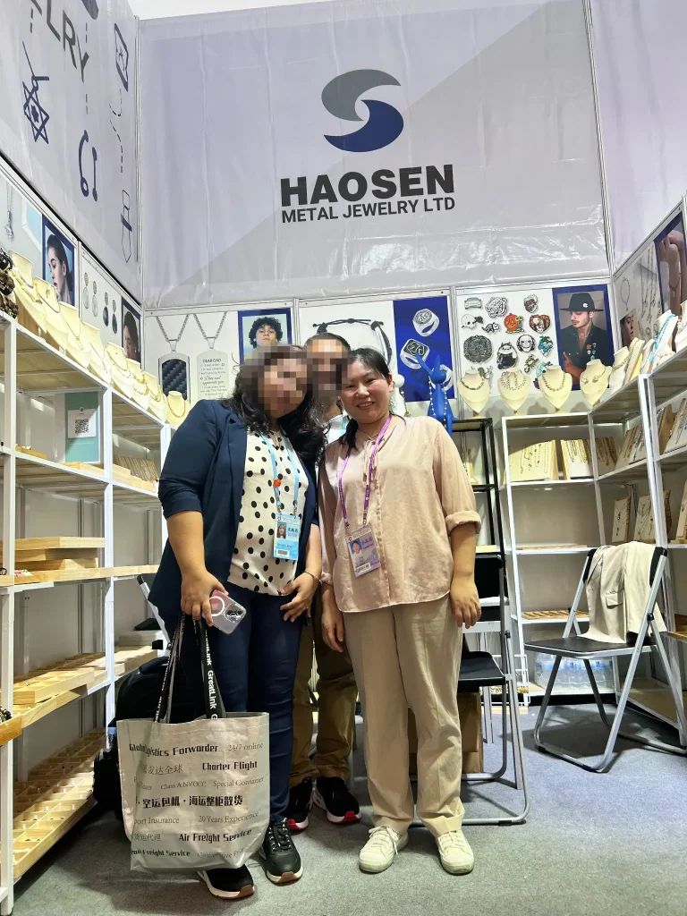 Haosen Jewelry booth at the Canton Fair with international buyers and fashion jewelry displays