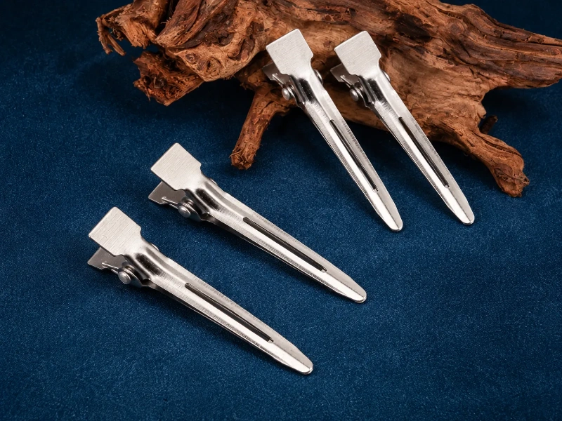 Stainless steel hair clip components with durable structures for custom hair accessory manufacturing.