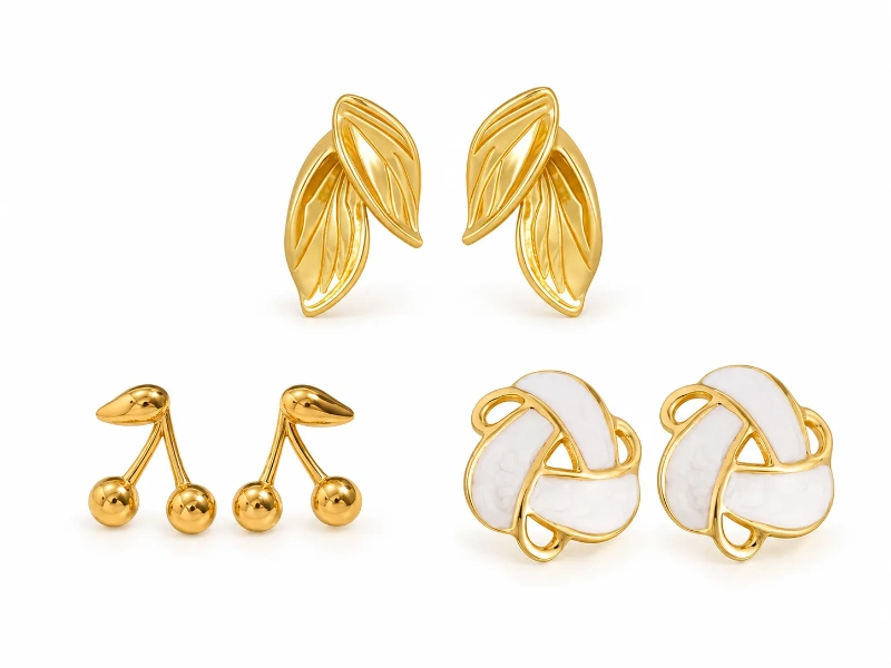 Custom stainless steel stud earrings in three gold-tone designs from a stud earring manufacturer.