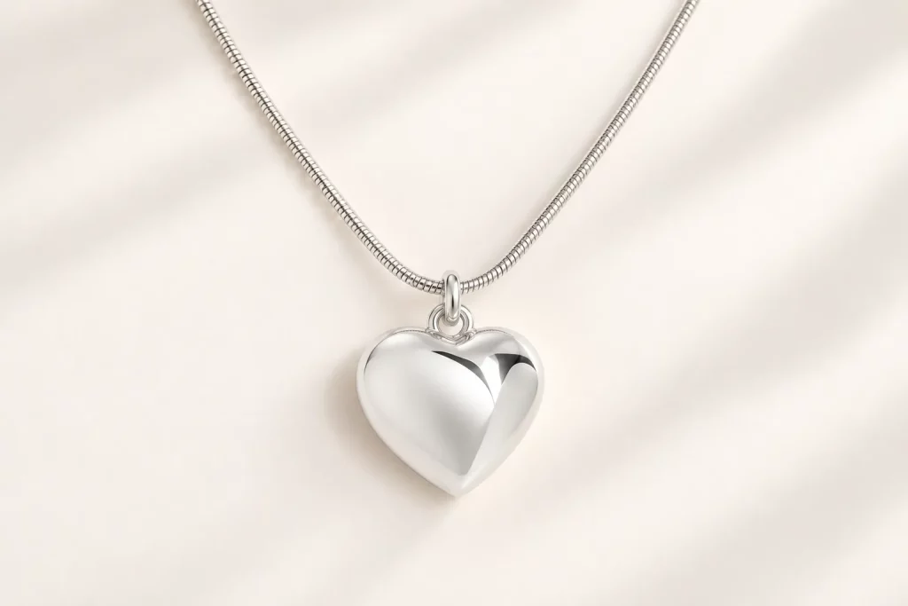 Custom silver-tone stainless steel puffy heart necklace with polished 3D pendant
