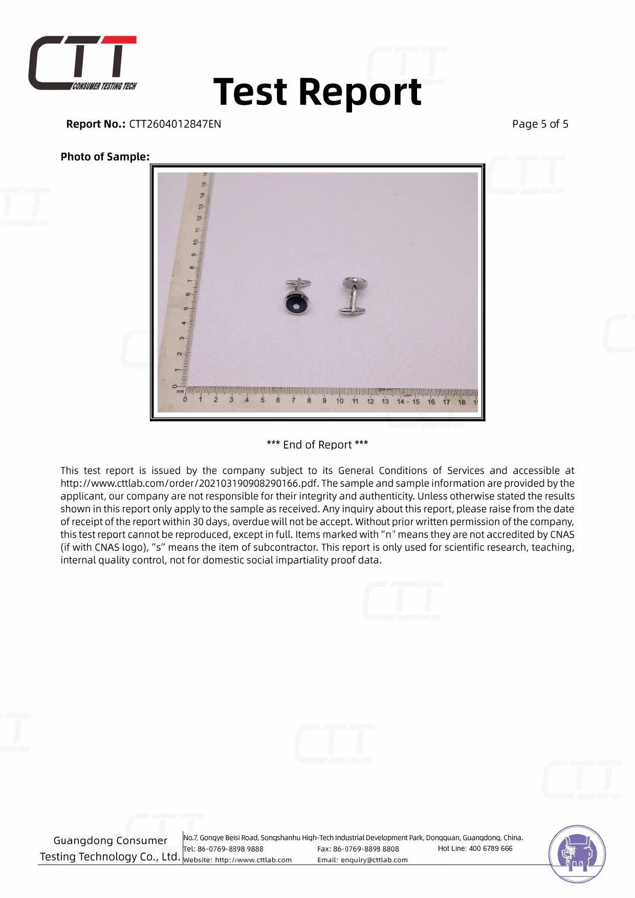 CTT test sample photo showing the navy round enamel cufflink front and back views beside a measuring ruler for sample identification.