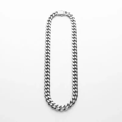 Custom polished stainless steel Miami Cuban link chain in 3:2 product shot – full length laid flat on white matte surface, top-down view with precision fold-over clasp. B2B ready for OEM/ODM orders, ideal for charm bracelet base chains or standalone jewelry.